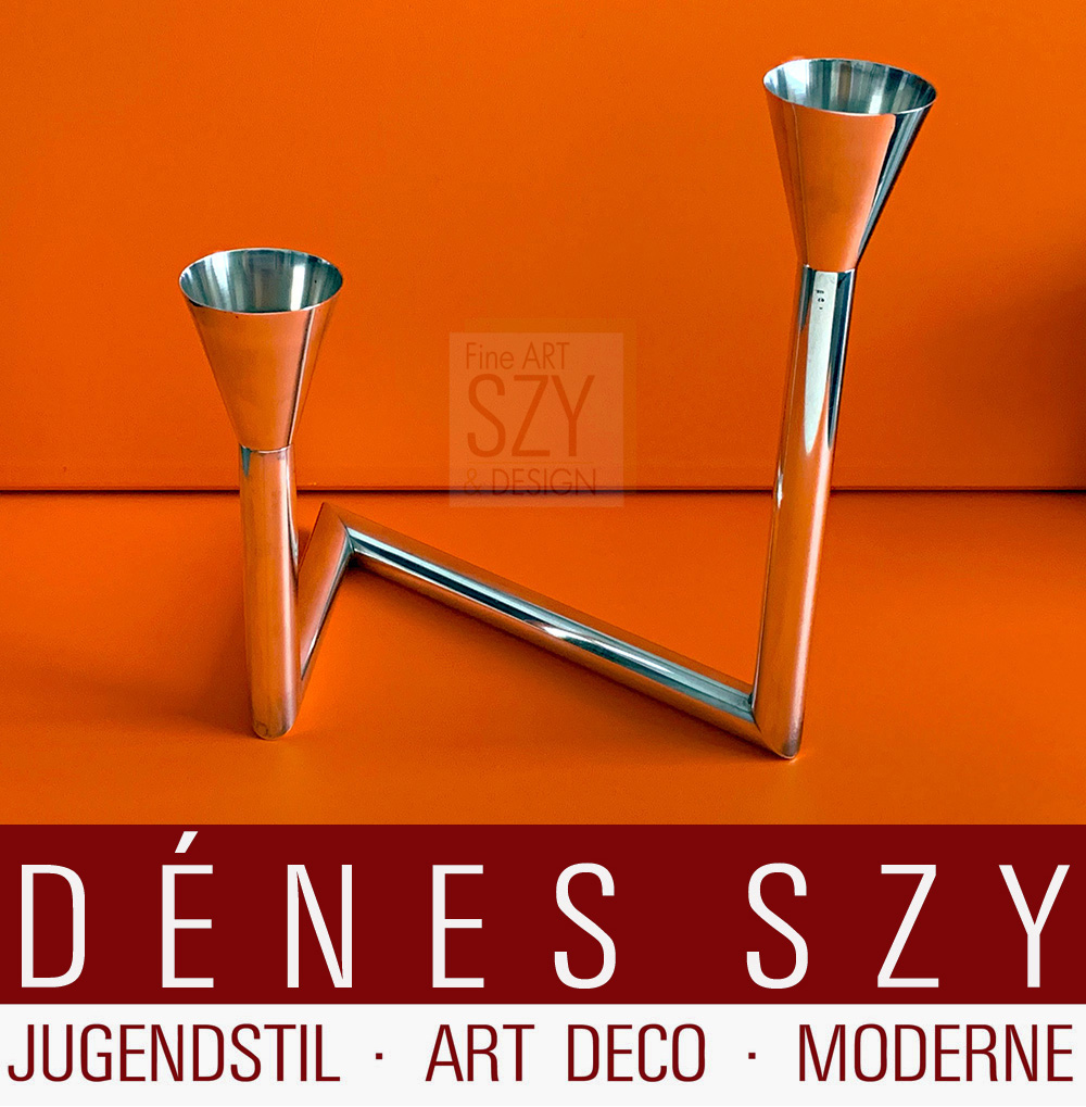 Table candleholder, candlestick, two-flame candelabra with torch-shaped spouts.