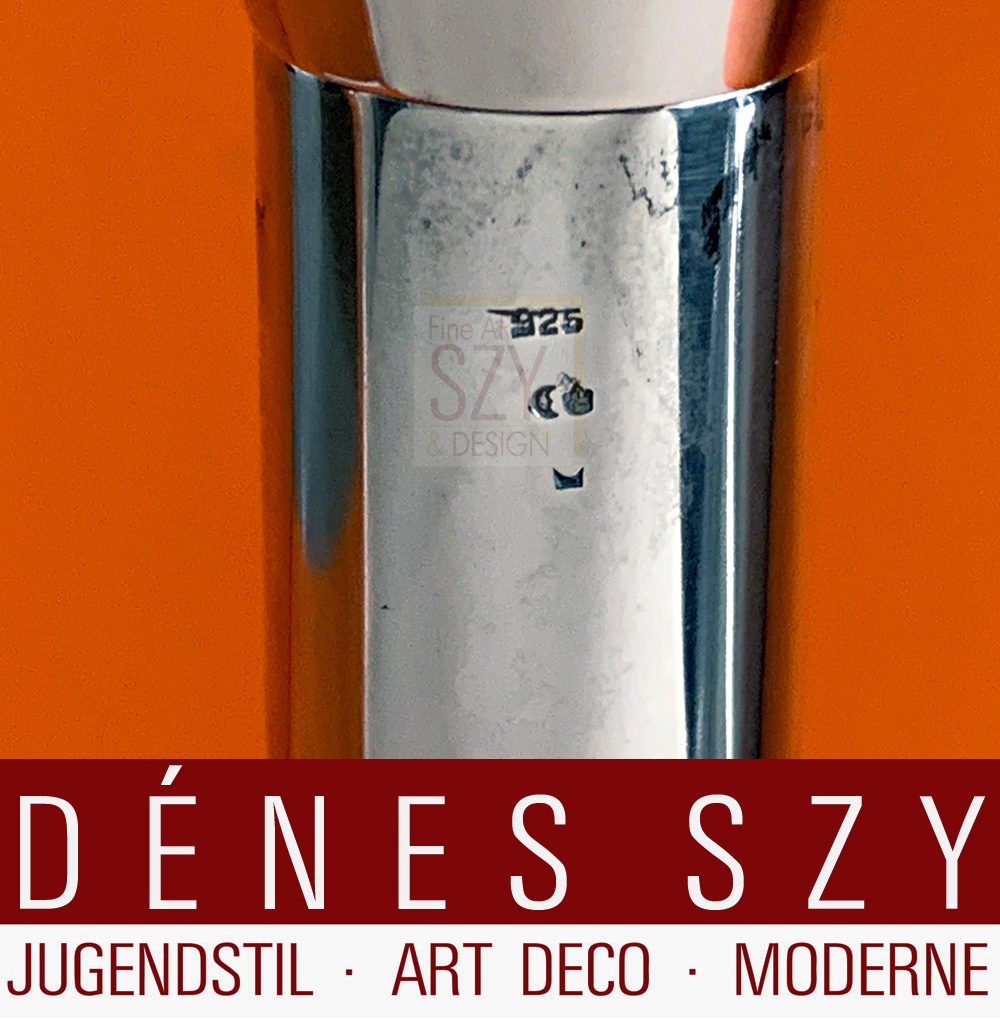 Table candleholder, candlestick, two-flame candelabra with torch-shaped spouts.