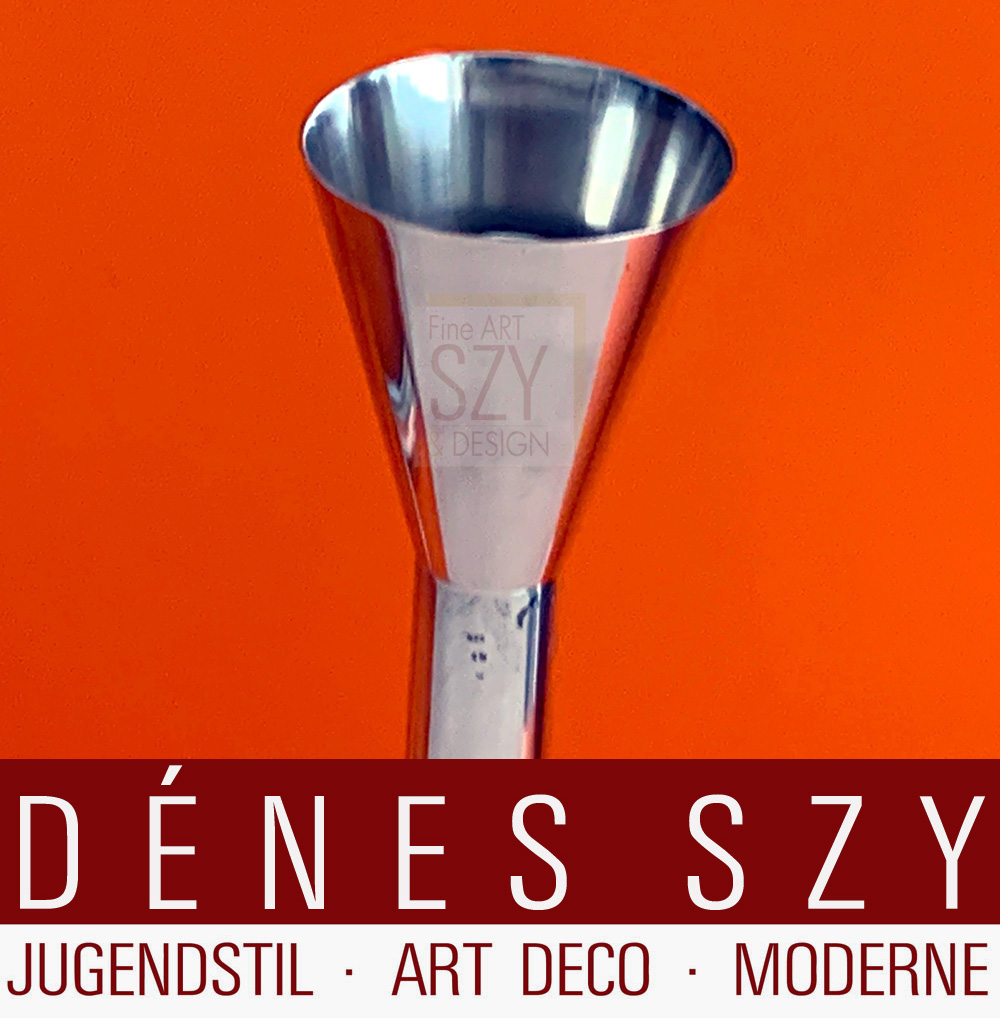 Table candleholder, candlestick, two-flame candelabra with torch-shaped spouts.