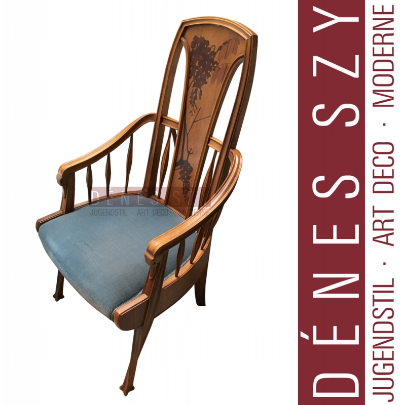 Louis Majorelle, Mahogany, nutwood and fruitwood, polished and with inlays. Upholstered. The backrest with twig-shaped inlays. Height 108cm, height of the seat approx. 46cm.
